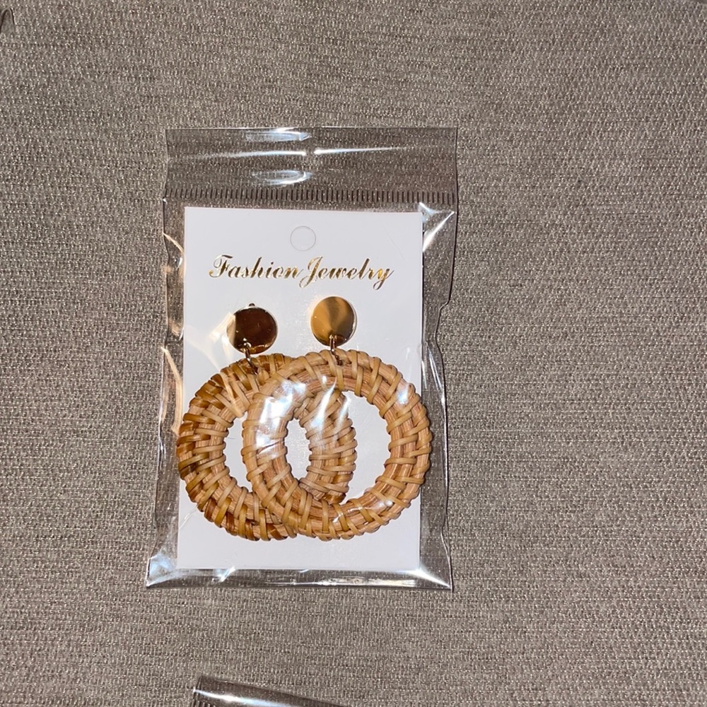 Brown wicker like material with gold attachments